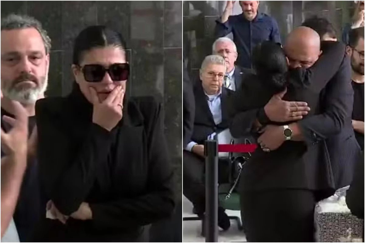 Esposa de Maguila é amparada ao chegar no velório do marido e se abrir