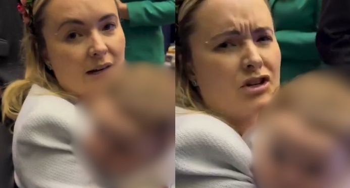 O deputado usa sua filha de 4 meses como um escudo nos distúrbios pró-ratingo na câmara